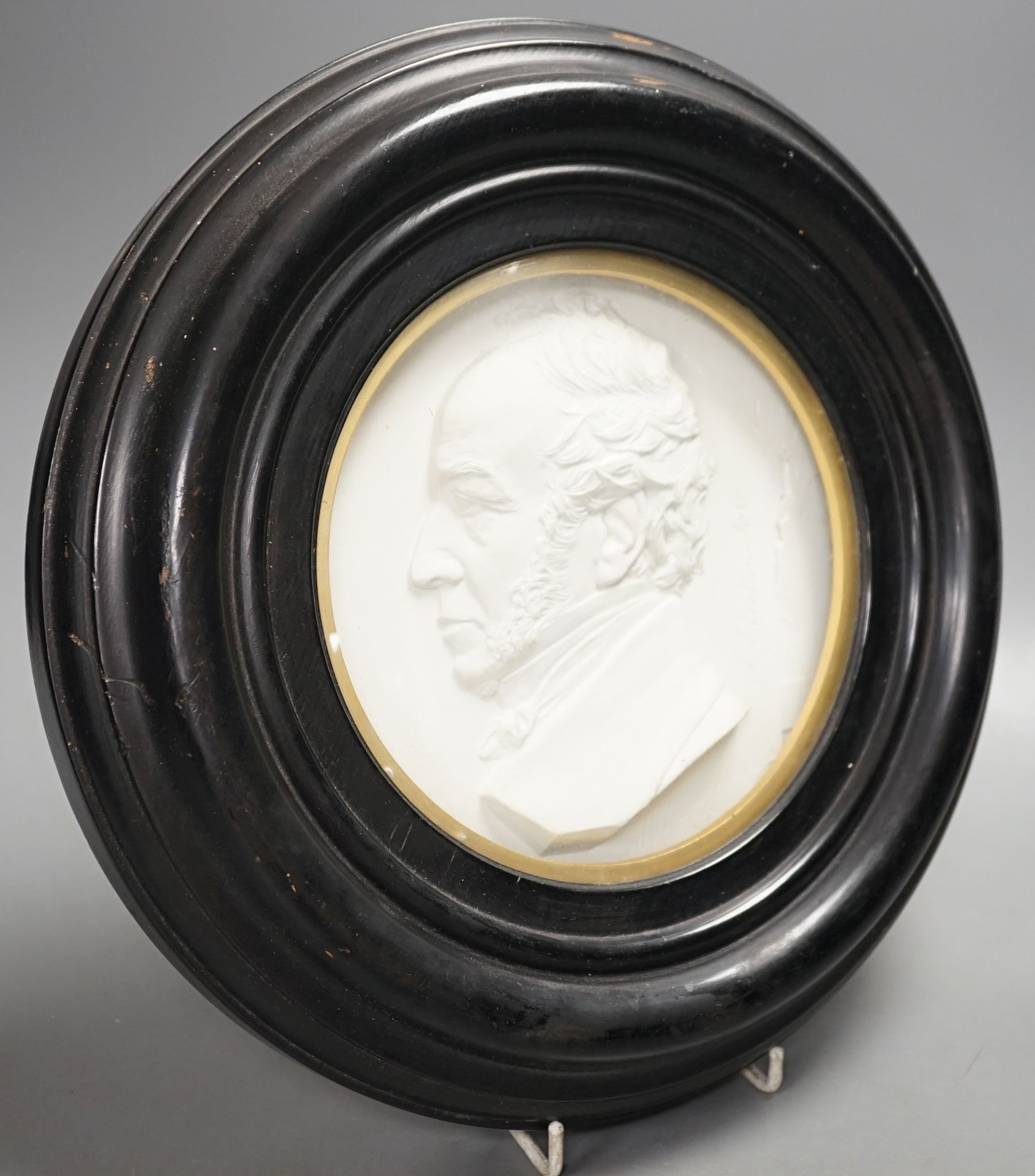 A 19th century cast plaster relief rounded portrait of Thomas Clutton Salt, lamp maker of Brimingham (af)